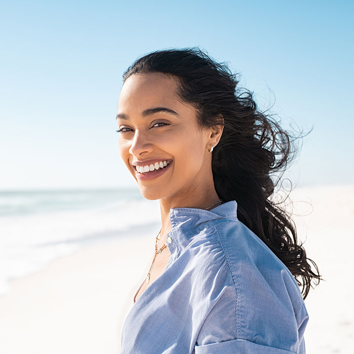 beautiful woman smiling on beach